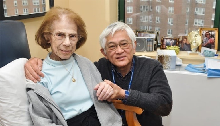 Elderly Couple in MJHS Residence Smiling at Camera